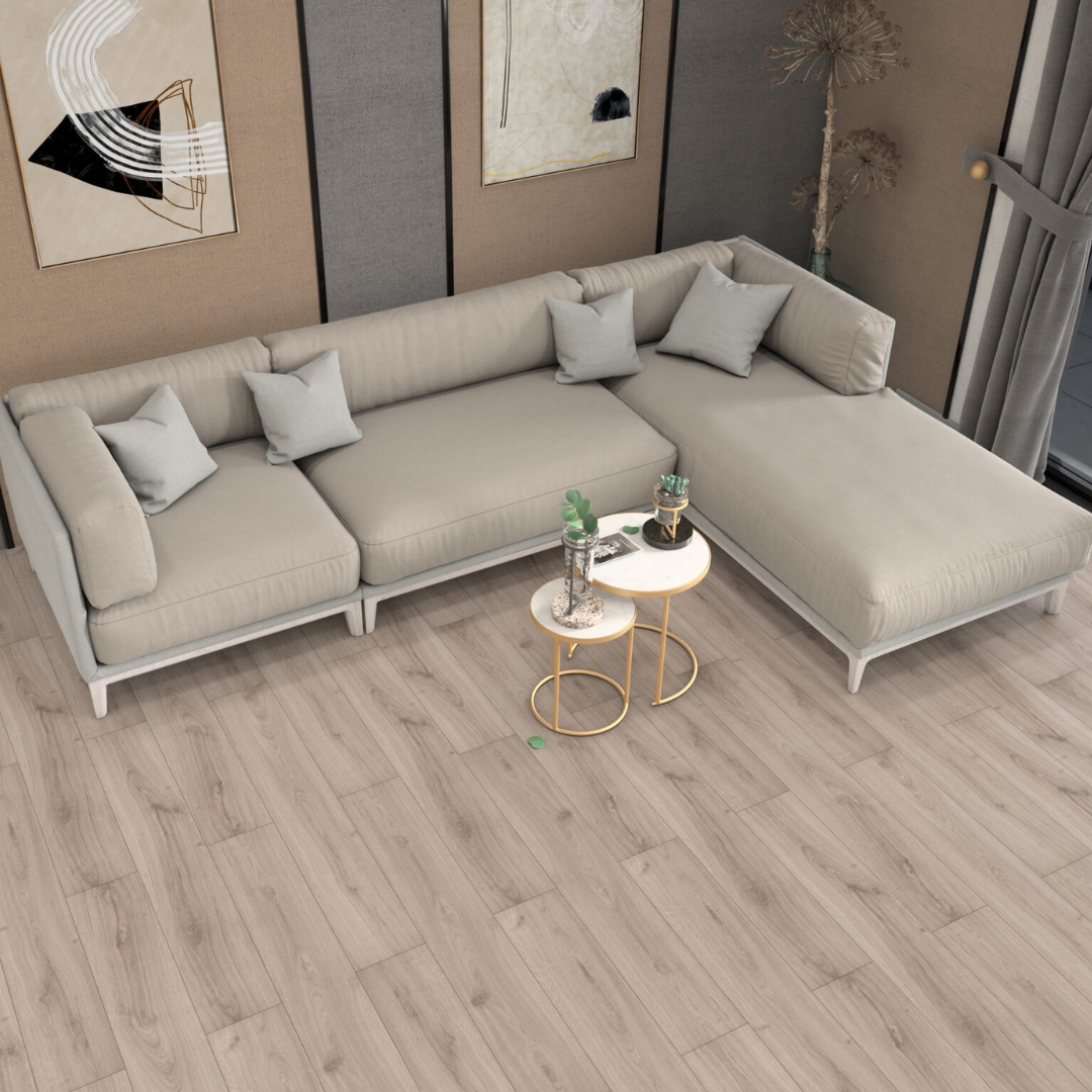 Photo shows modern lounge area from above with light wood style laminate flooring