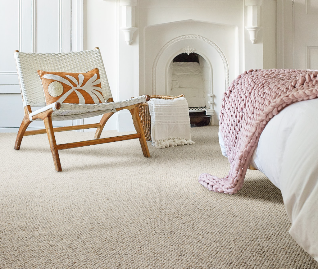Royal Wilton wool loop bedroom carpet in a light natural tone